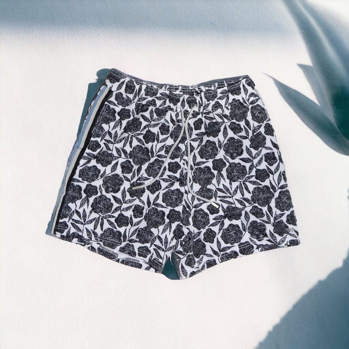 Le Club Apparel & Accessories > Clothing > Shorts White & Black Oasis Floral Print Men's Swim Trunk Board Shorts 2024 Le Club Oasis Black & White Floral Men's Swim Trunk Shorts