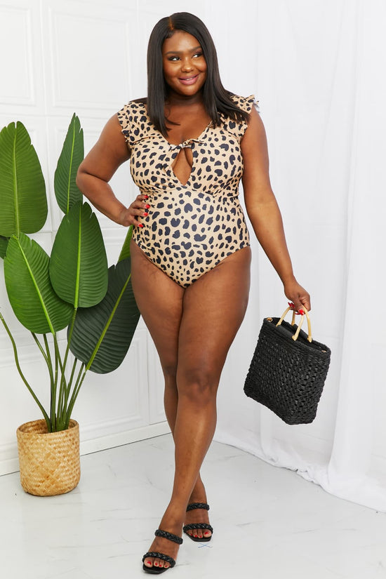 Trendsi Apparel & Accessories > Clothing > Swimwear Marina West Swim Seashell Ruffle Sleeve One-Piece in Leopard