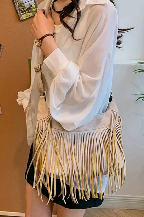 Trendsi Apparel & Accessories > Clothing > Swimwear Suede Fringe Adjustable Strap Shoulder Bag Suede Fringe Adjustable Strap Shoulder Bag
